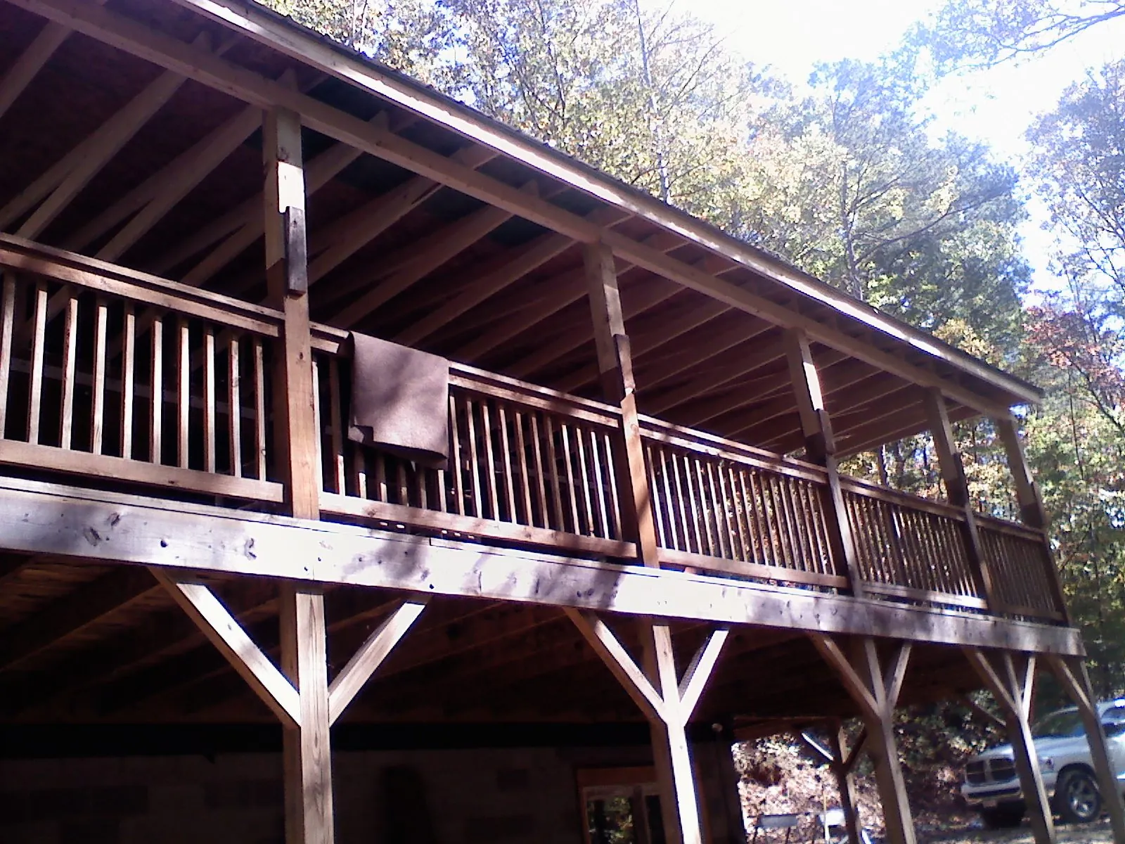 Timber framing under a new elevated porch and deck — Roof Leak Repair in South Acworth by Roofing Brothers